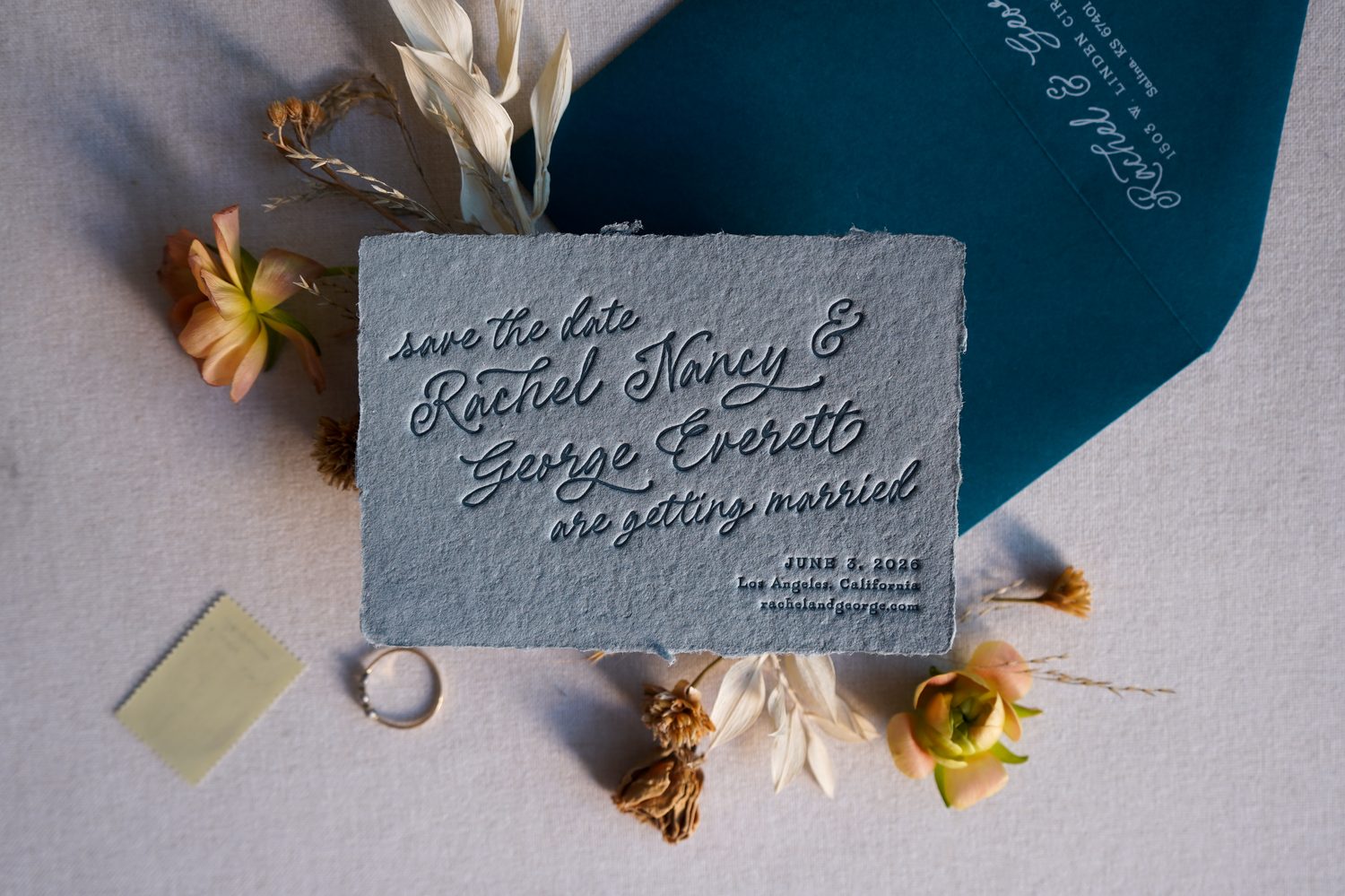 modern save the date cards letterpress printed on seeded denim handmade paper