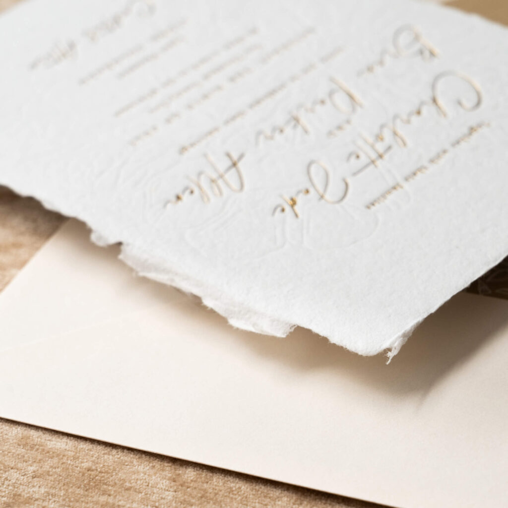 gold foil wedding invitations on handmade paper
