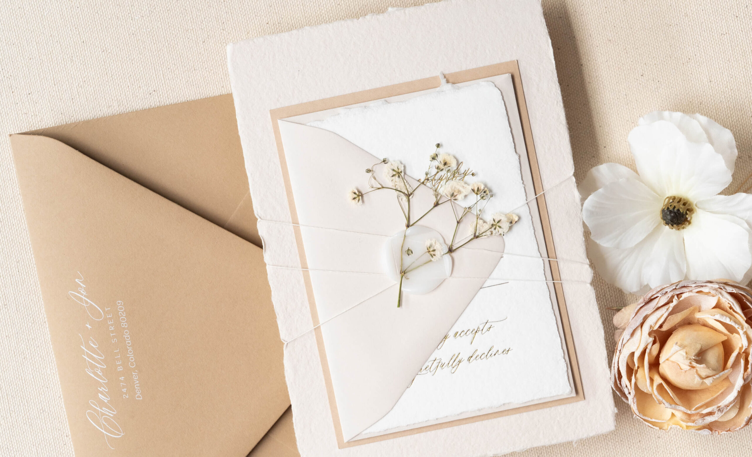 luxury handmade wedding invitations with pressed baby's breath wax seals